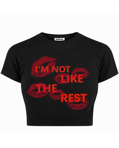 I'M NOT LIKE THE REST BABY TEE